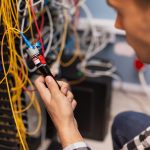 engineer-man-testing-the-optical-fiber.jpg
